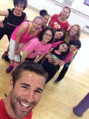 A selfie of group fitness instructors at a Zumba kids training.