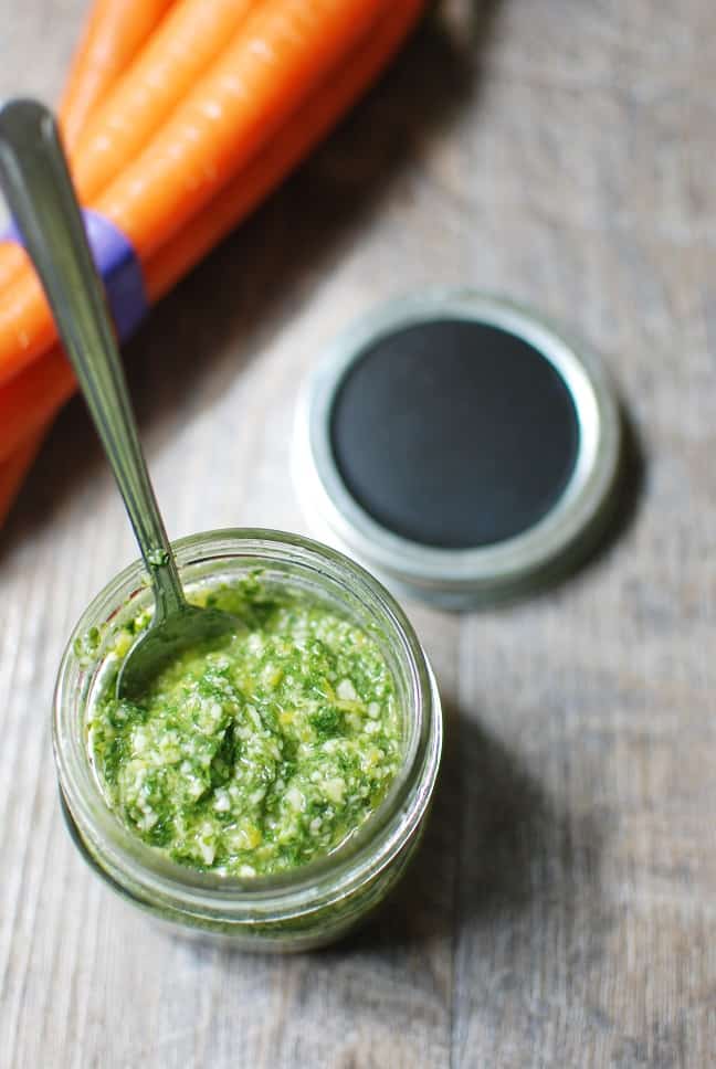 Carrot top pesto is an easy recipe that tastes delicious. Use it over grilled chicken, roasted potatoes, drizzled over avocado toast, or any way you see fit!