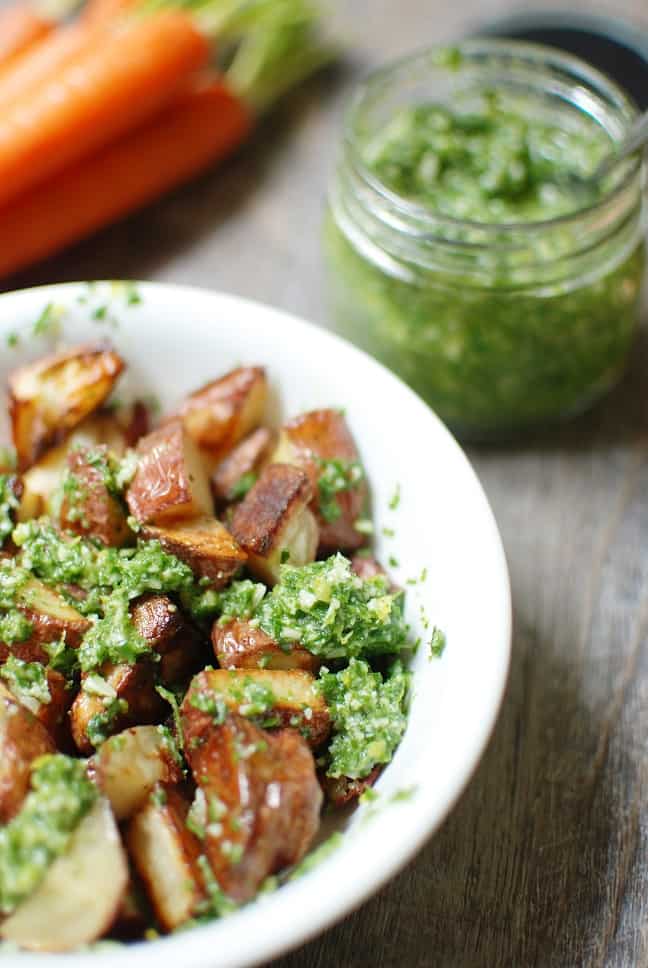 Carrot top pesto is an easy recipe that tastes delicious. Use it over grilled chicken, roasted potatoes, drizzled over avocado toast, or any way you see fit!