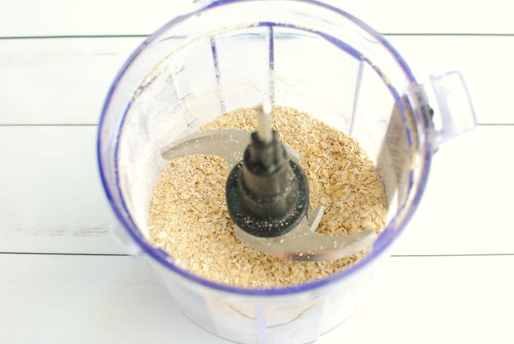 Oats pulsed into a coarse flour in a small food processor.