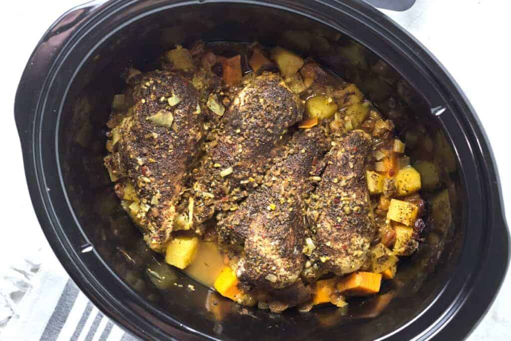 Crockpot spicy Caribbean chicken with pineapples and sweet potatoes.