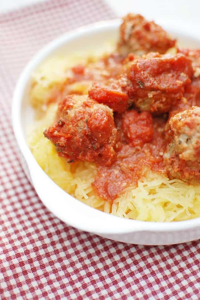 Crockpot spaghetti squash and meatballs makes a healthy & tasty family dinner! 