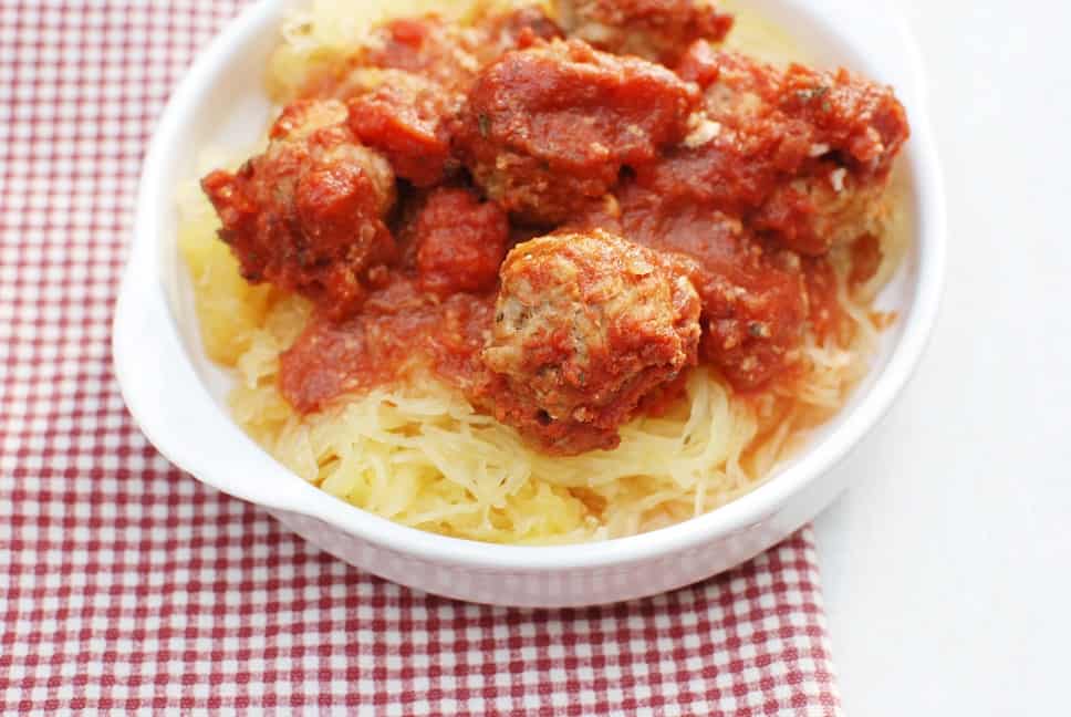 Crockpot spaghetti squash and meatballs makes a healthy & tasty family dinner! Slow cooker for the win.