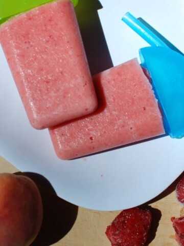 Strawberry and Peach Popsicles.