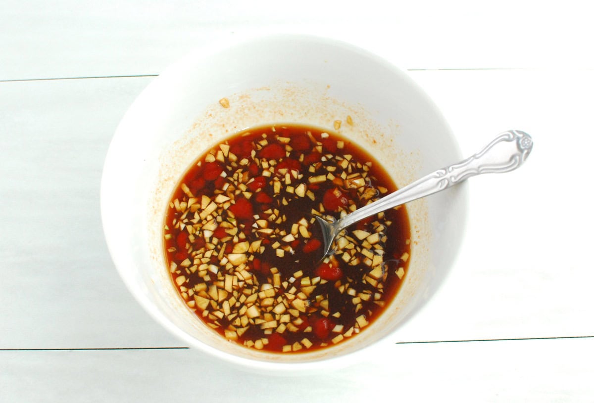 The stir fry sauce ingredients in a white bowl.