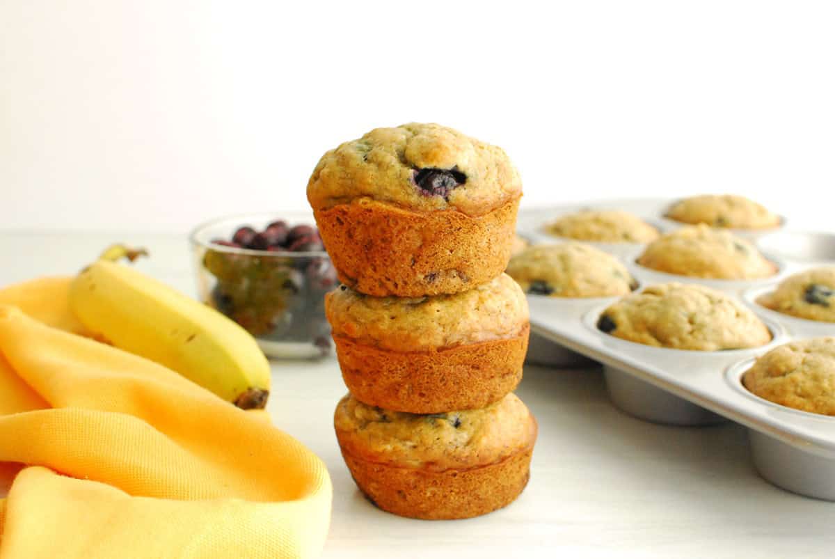 A stack of three banana blueberry muffins.