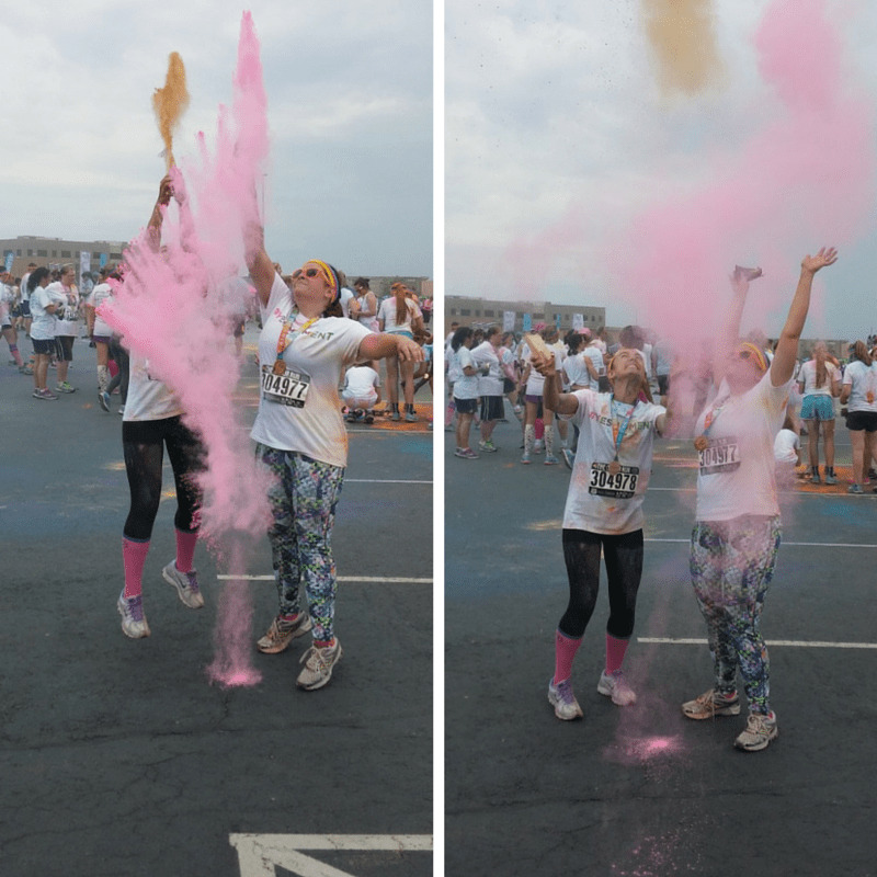 Two women at a color run event.
