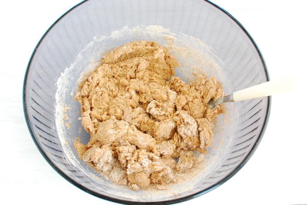 Bread batter in a bowl before folding in squash.