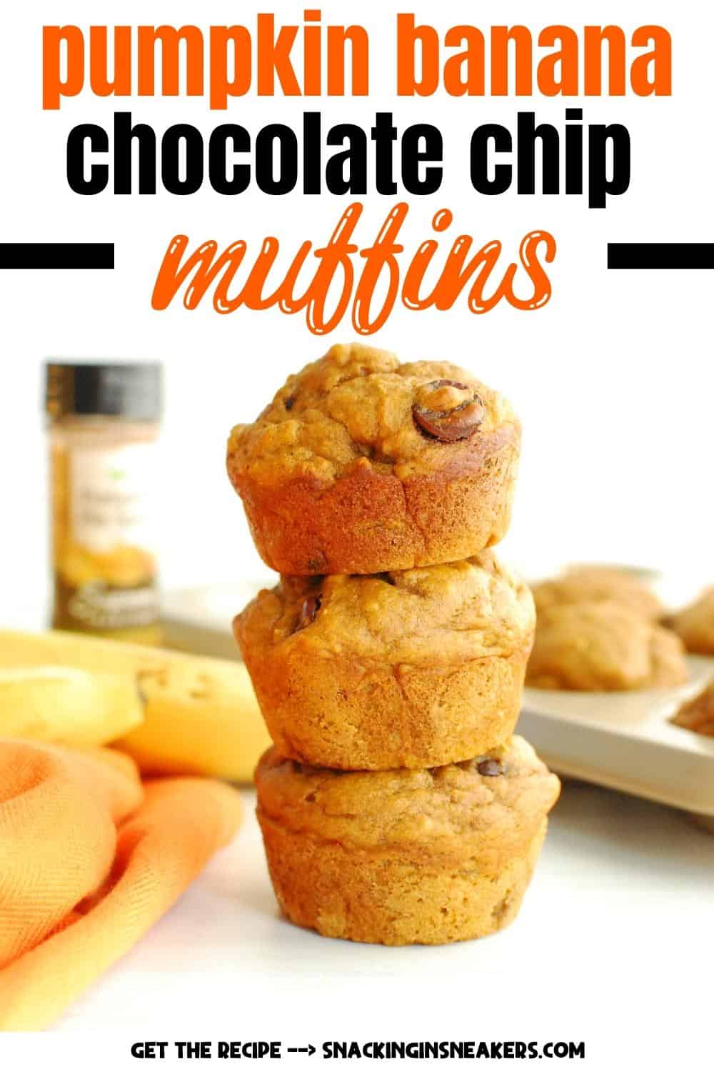 Three pumpkin banana chocolate chip muffins stacked on top of eachother.