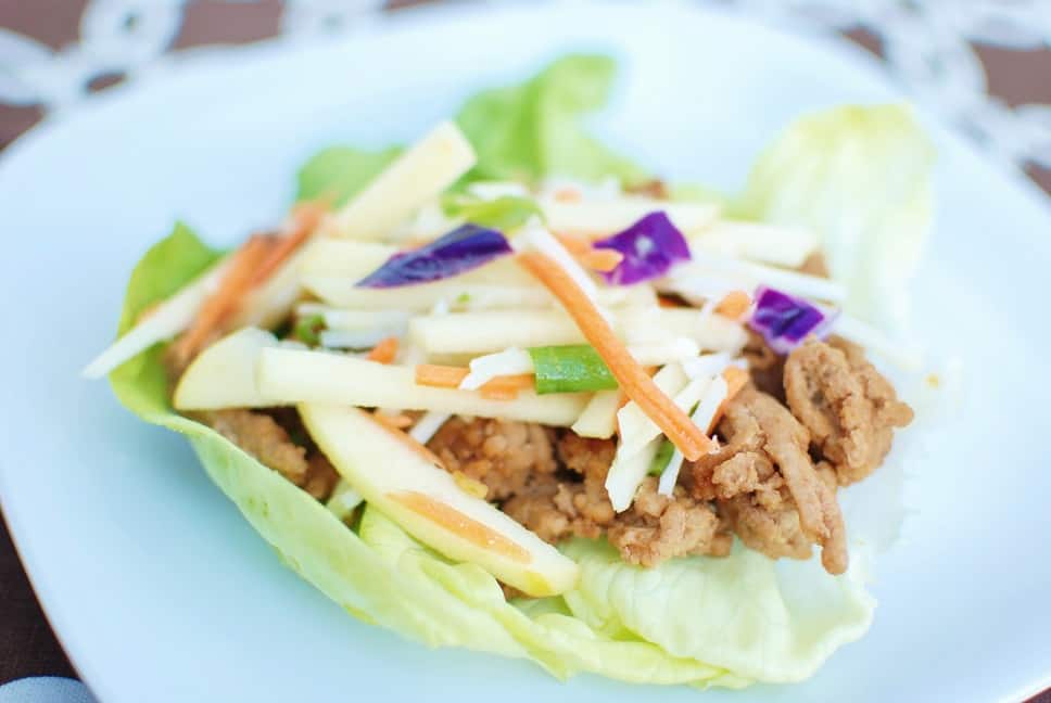 Thai Lettuce Wraps made with ground turkey and topped with a cabbage apple slaw.