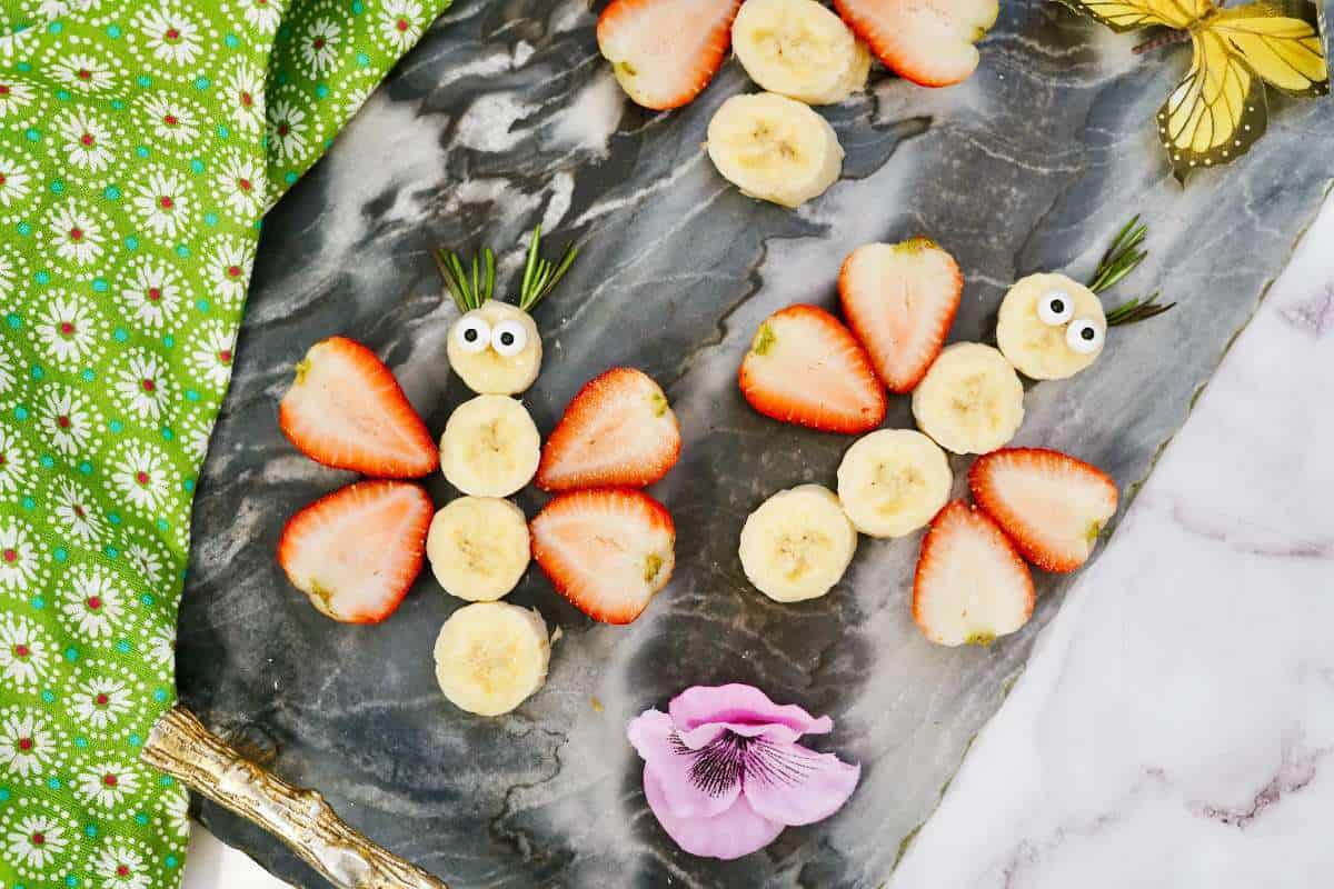 Cute butterflies made out of strawberries and bananas.