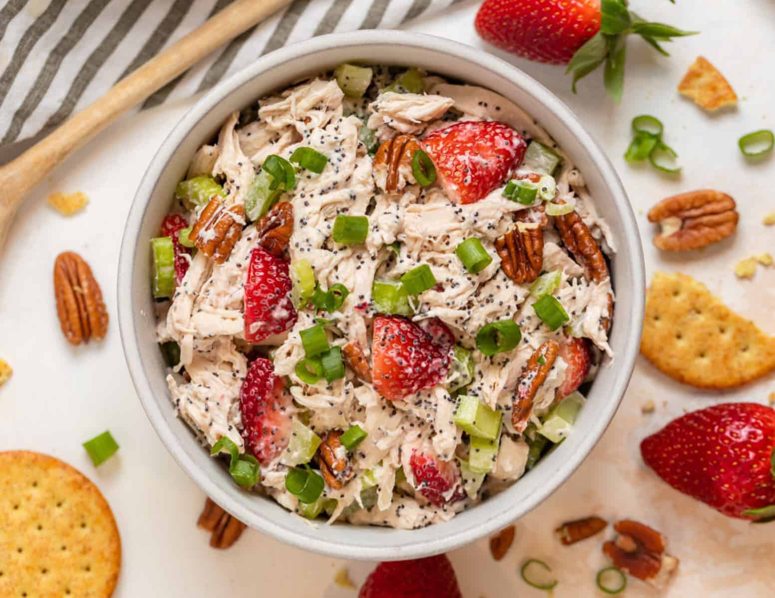 A bowl of strawberry chicken salad.