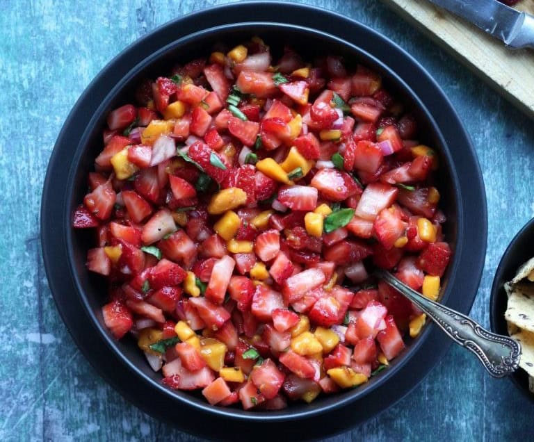 A bowl of fresh strawberry salsa.