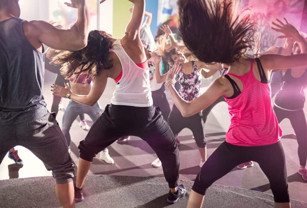 A group of people in a cardio dance class.