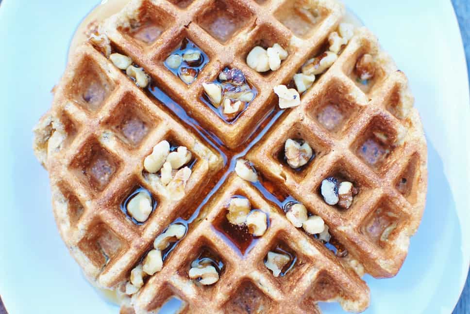 These acorn squash waffles are a perfect family breakfast on a cold winter morning! They’re healthier than most waffle recipes since they’re whole grain and contain a vegetable – plus they are easy to whip up quickly.