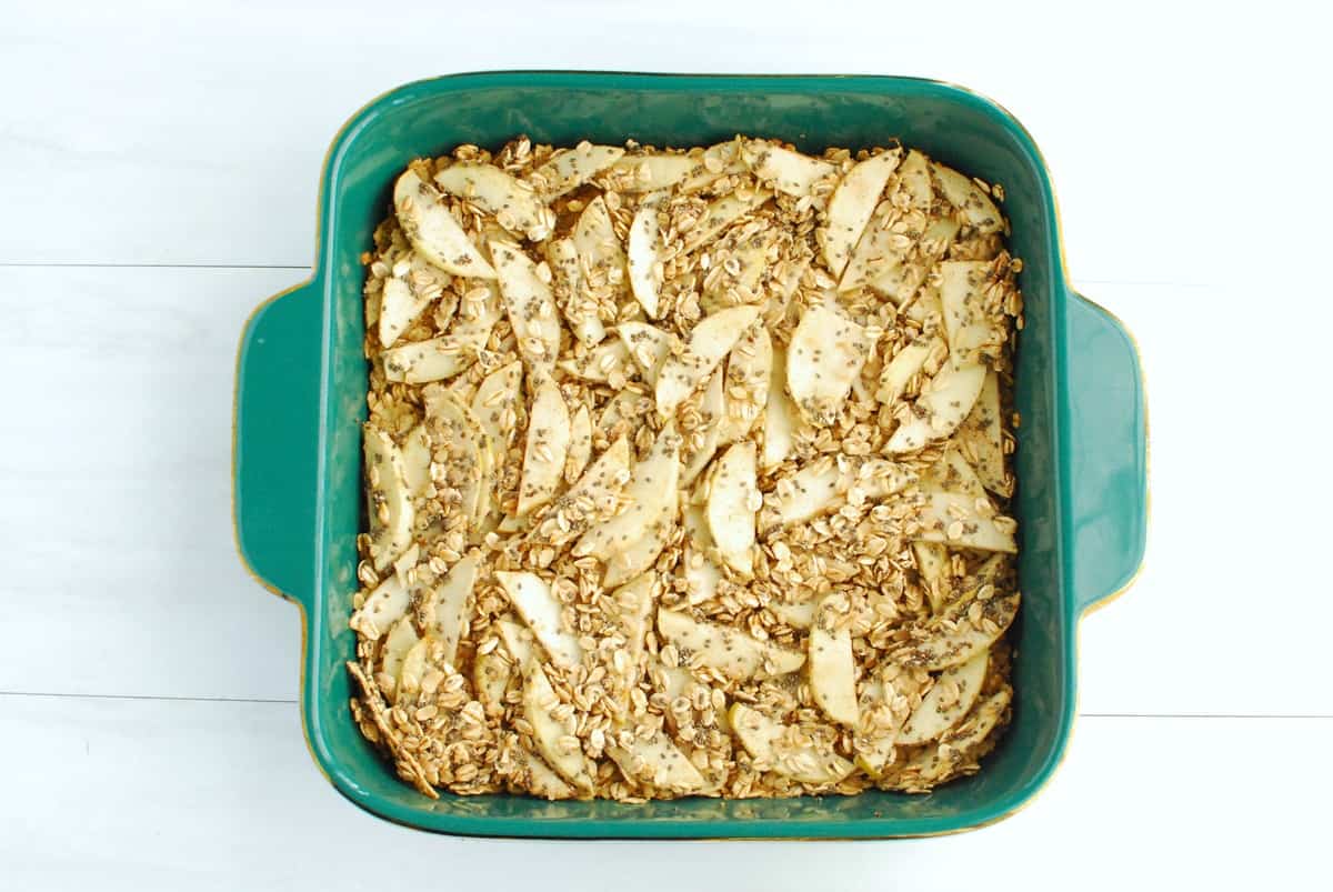 Just-baked healthy apple oatmeal bars in an 8x8 baking dish.