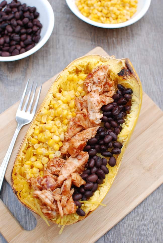 These BBQ chicken spaghetti squash bowls are a perfect way to combine your love of BBQ with a veggie rich dish. With less than 10 ingredients and only 500 calories per serving, it’s a healthy dish that’s easy to make!