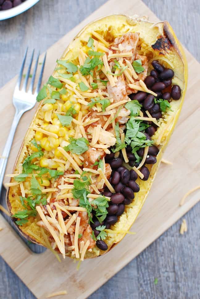 These BBQ chicken spaghetti squash bowls are a perfect way to combine your love of BBQ with a veggie rich dish. With less than 10 ingredients and only 500 calories per serving, it’s a healthy dish that’s easy to make!