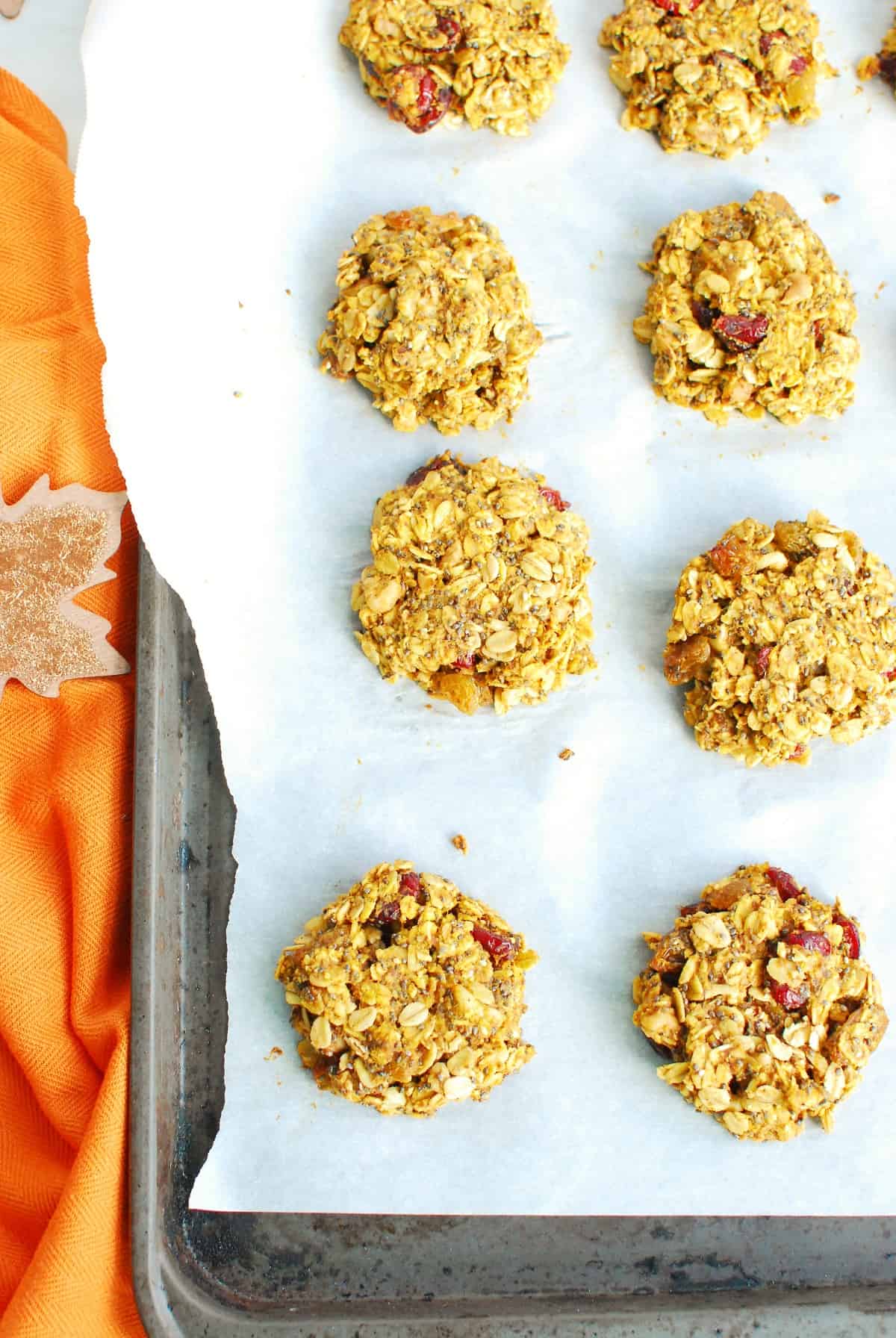 A baking sheet with freshly baked pumpkin breakfast cookies.