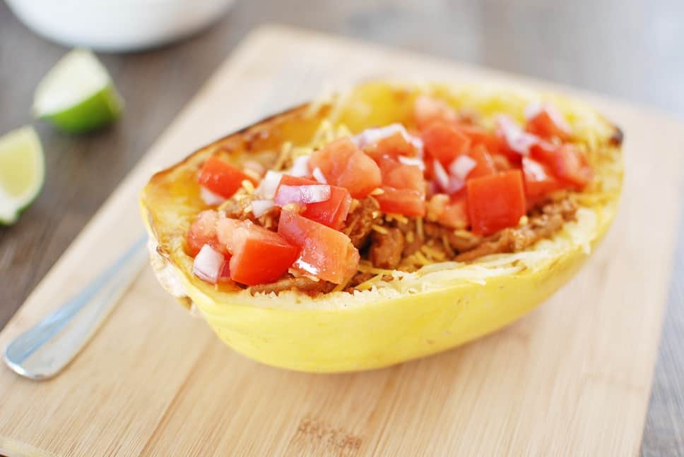 Spaghetti squash taco boats are tasty, nutritious, and perfect for a family dinner! Instead of using shells for your tacos, you simply add the meat and homemade salsa on top of roasted spaghetti squash. And at under 400 calories each, it’s a filling meal you can feel good about eating! Gluten free and dairy free options available.