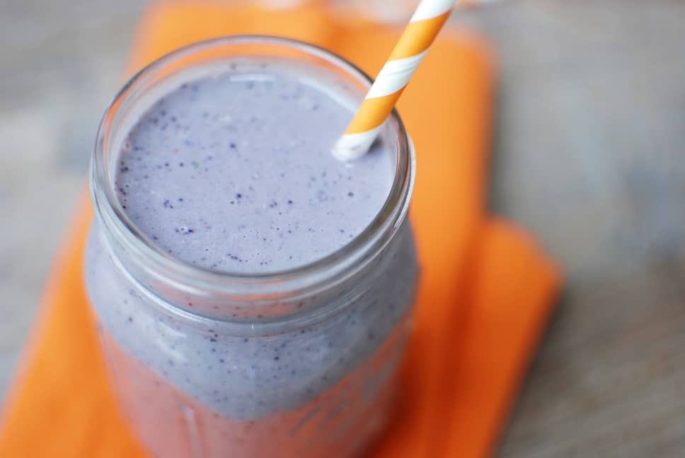 Wild blueberry smoothie in a mason jar 