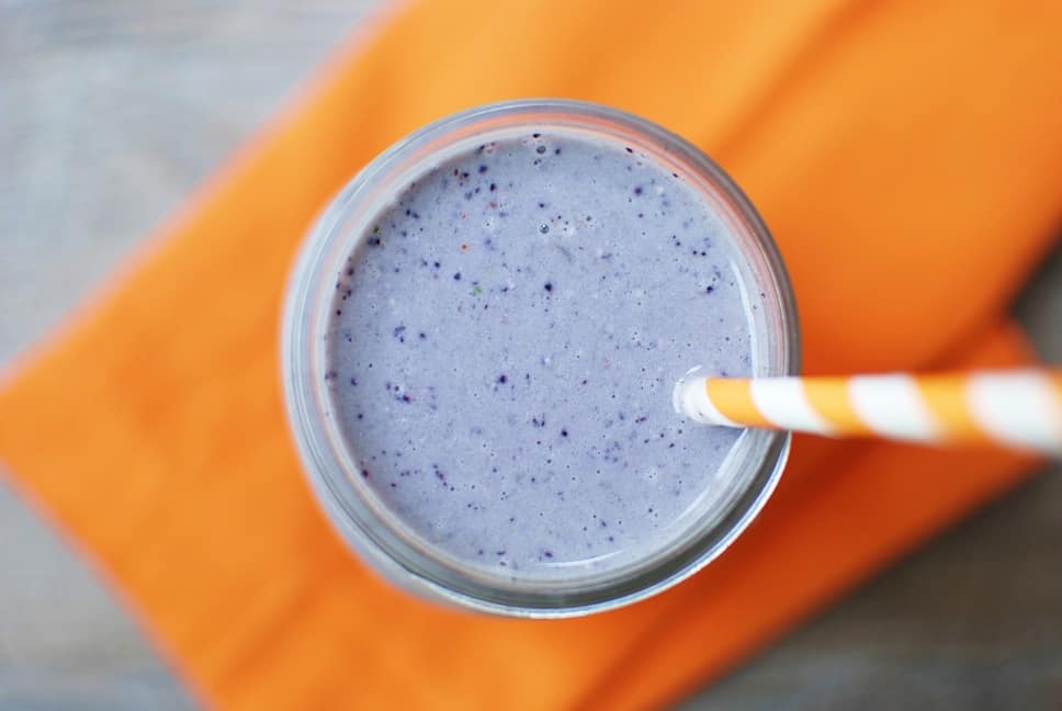 This wild blueberry pancake smoothie is just like it sounds – all the flavors of a blueberry pancake in a healthy smoothie recipe! It’s easy to make and is perfect for breakfast, to split as a snack, or enjoy as a post workout recovery meal. Plus, it packs in 17 grams of protein from whole food ingredients!