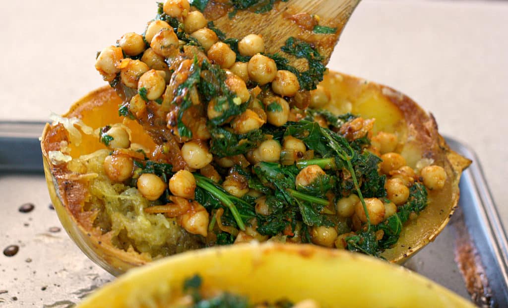 Chickpea kale curry in a spaghetti squash boat? Heck yes! This is such a tasty and healthy spaghetti squash recipe.