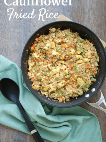 Cauliflower fried rice is a 30 minute meal that tastes like Chinese takeout – but in a healthier at home recipe! With less than 10 ingredients, you’ll have this low calorie, low carb dish. Enjoy a small portion for a side dish or a large portion for dinner! | Vegetarian | Dairy Free | Family Friendly