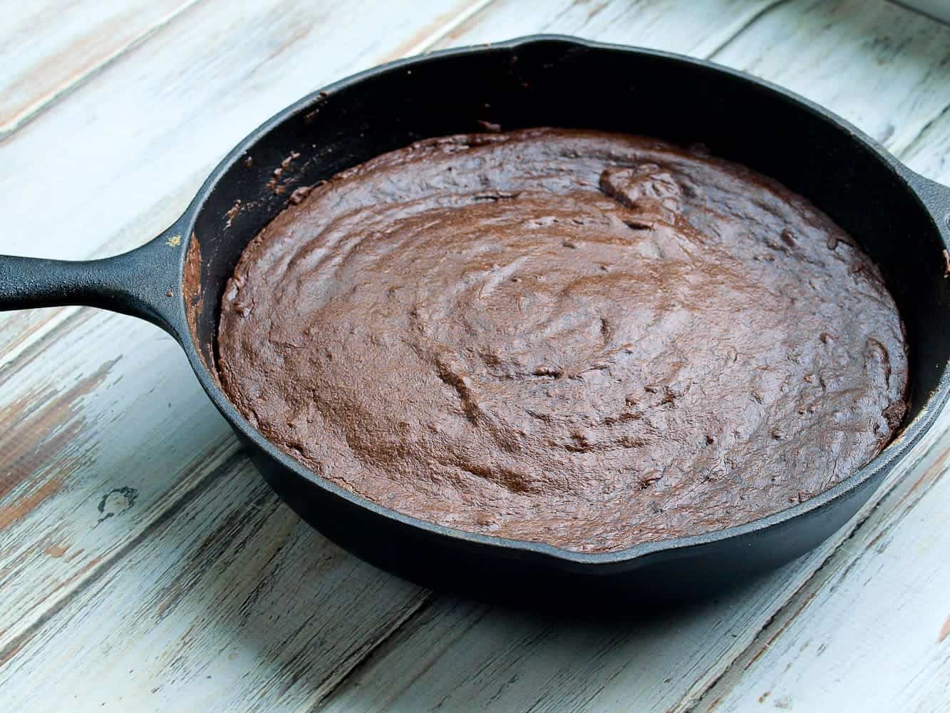 A skillet with chocolate fudge banana cake.