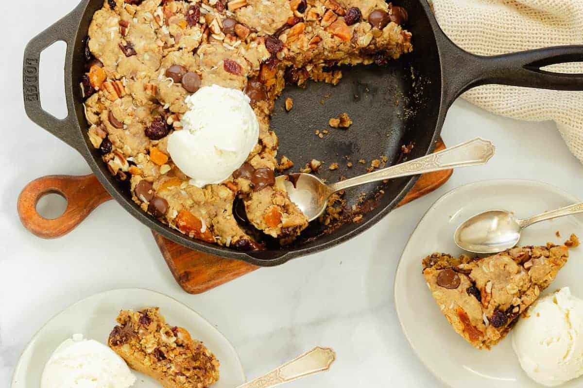A oatmeal, fruit, and nut skillet cookie.