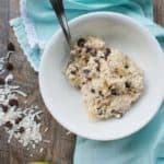 Healthy cookie dough oatmeal will rock your breakfast world! This gluten free recipe is primarily naturally sweetened with banana and yogurt – plus the indulgent addition of a few chocolate chips and shredded coconut.