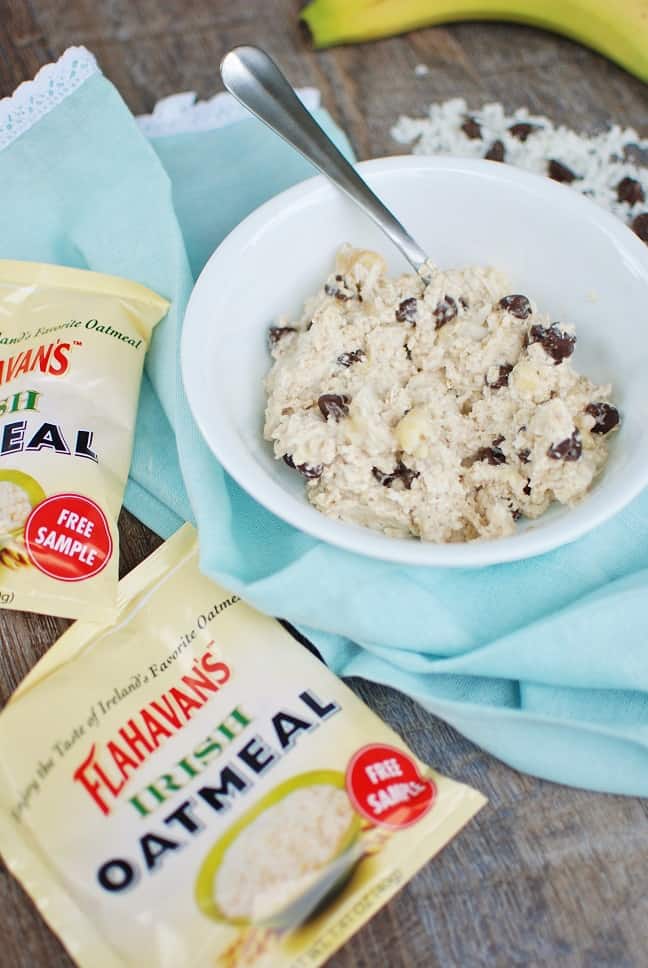 Healthy cookie dough oatmeal will rock your breakfast world! This gluten free recipe is primarily naturally sweetened with banana and yogurt – plus the indulgent addition of a few chocolate chips and shredded coconut.