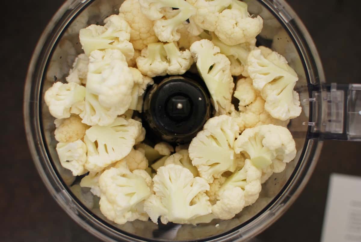 Cauliflower florets in a food processor.