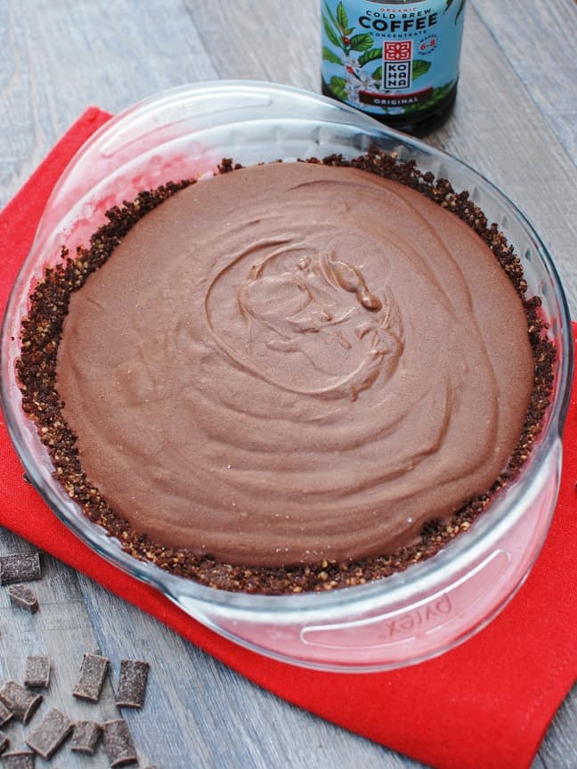 This no bake vegan chocolate pie is one of the yummiest desserts out there! This better-for-you option tastes incredibly rich and decadent, yet clocks in at just 250 calories per slice. Plus it’s vegan and gluten free!