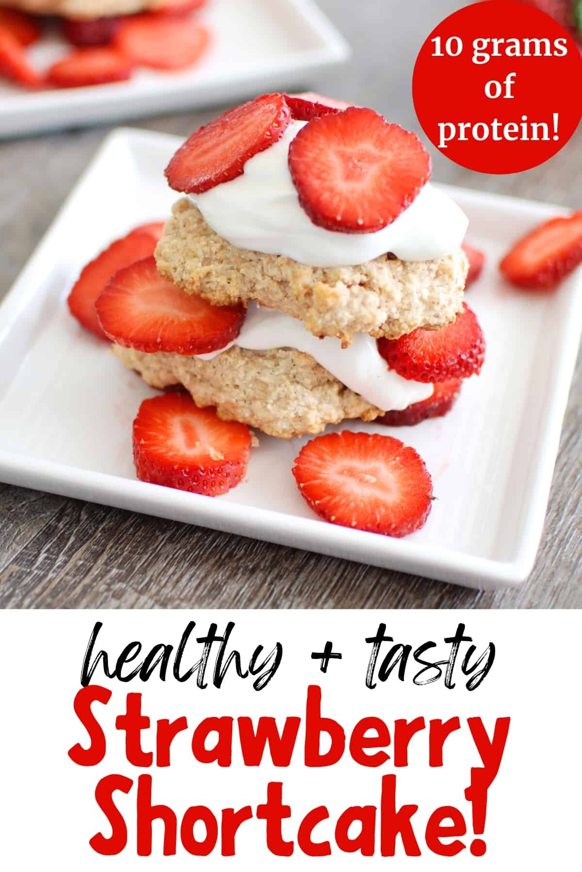 A healthy strawberry shortcake with layered strawberries and yogurt, with a text overlay with the name of the recipe.