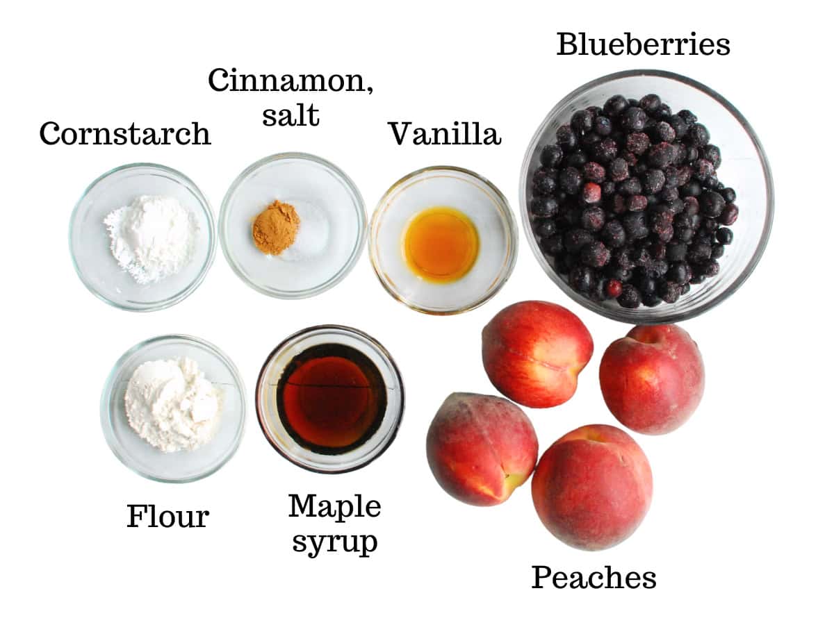 Blueberries, peaches, maple syrup, flour, cornstarch, cinnamon, salt, and vanilla.