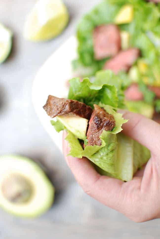 These steak lettuce wraps are fresh and light, yet filling too! Think healthy lettuce wraps made with tasty marinated beef, avocado, and mango. 