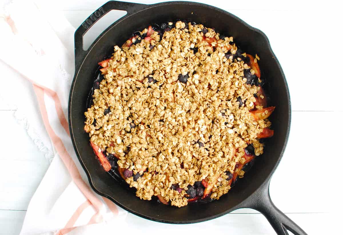 Just baked peach blueberry crisp in a cast iron skillet.