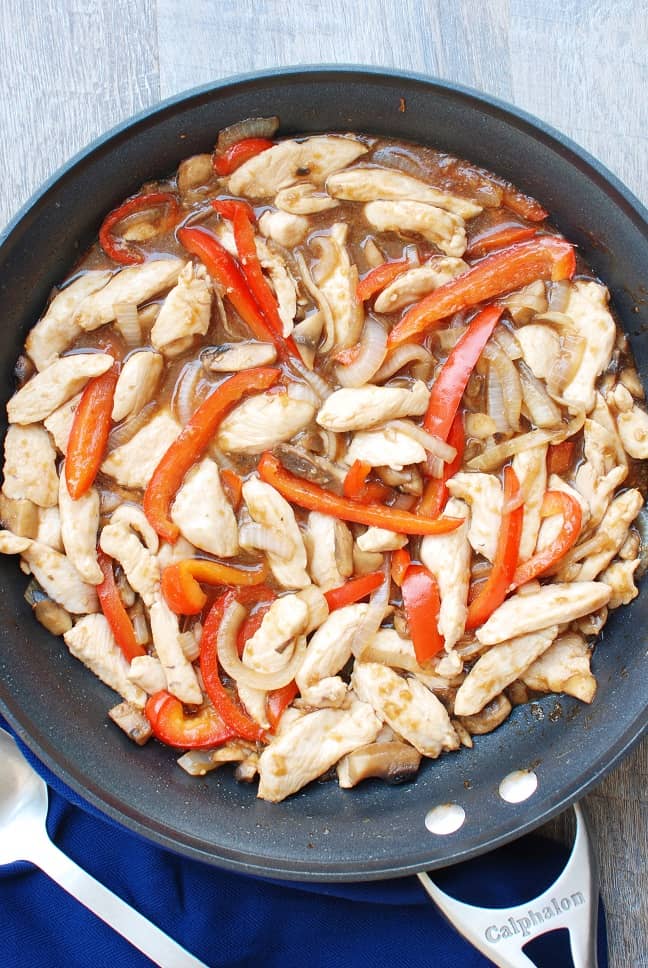 Pan full of homemade chicken teriyaki with healthy teriyaki sauce
