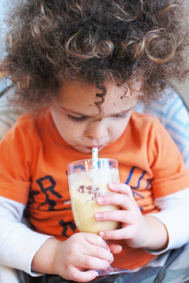 Child drinking a smoothie