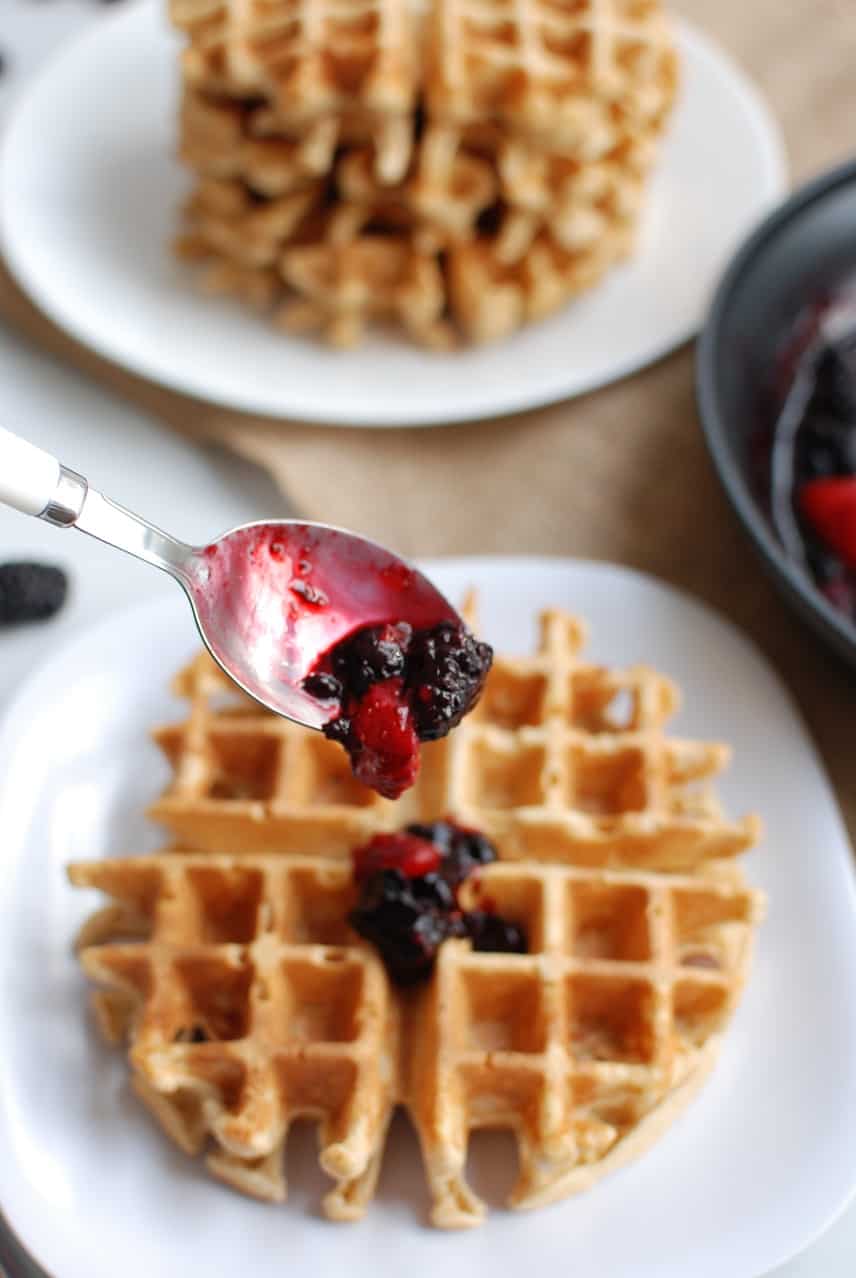 Whole grain einkorn waffles with warm berry compote