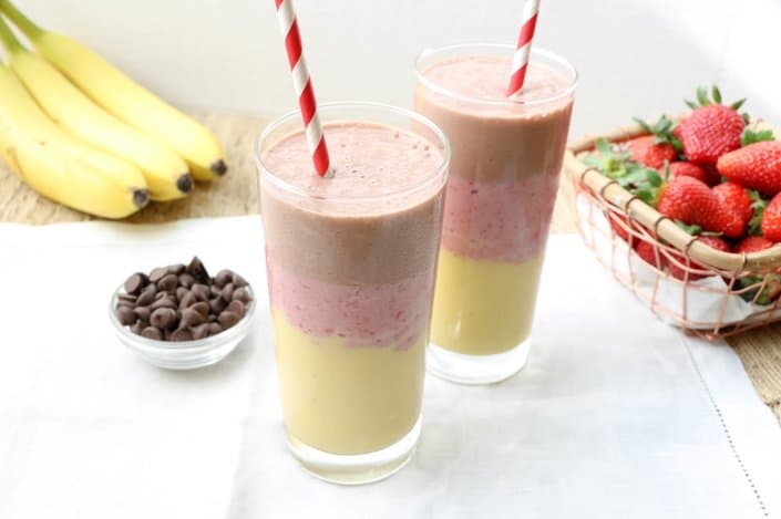 Layered banana split smoothie with no yogurt in a glass