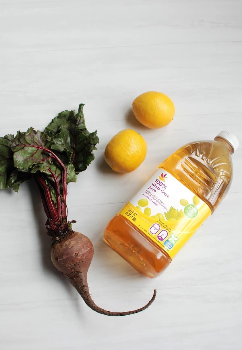 three ingredients for beet lemonade - beets, grape juice, and lemons