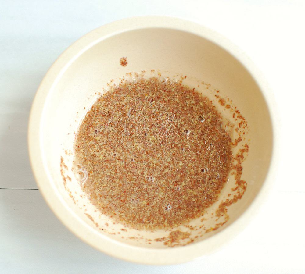 Flax mixed with water in a small bowl.