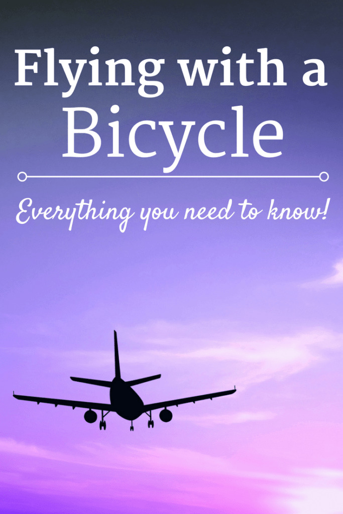 Airplane flying in the sky at a sunset with a text overlay about flying with a bike.