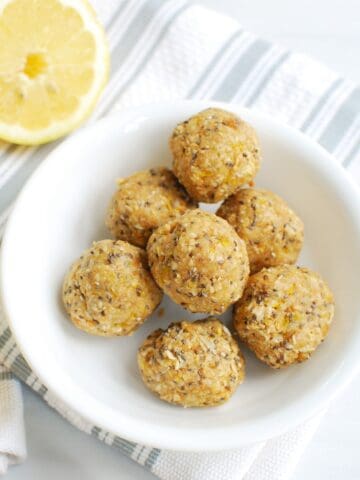 A bowl filled with lemon energy bites.