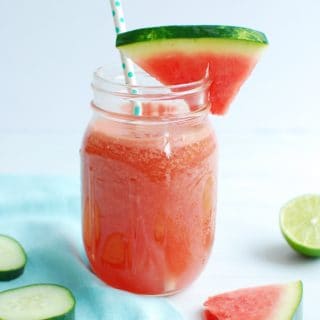 Mason jar full of cucumber watermelon smoothie