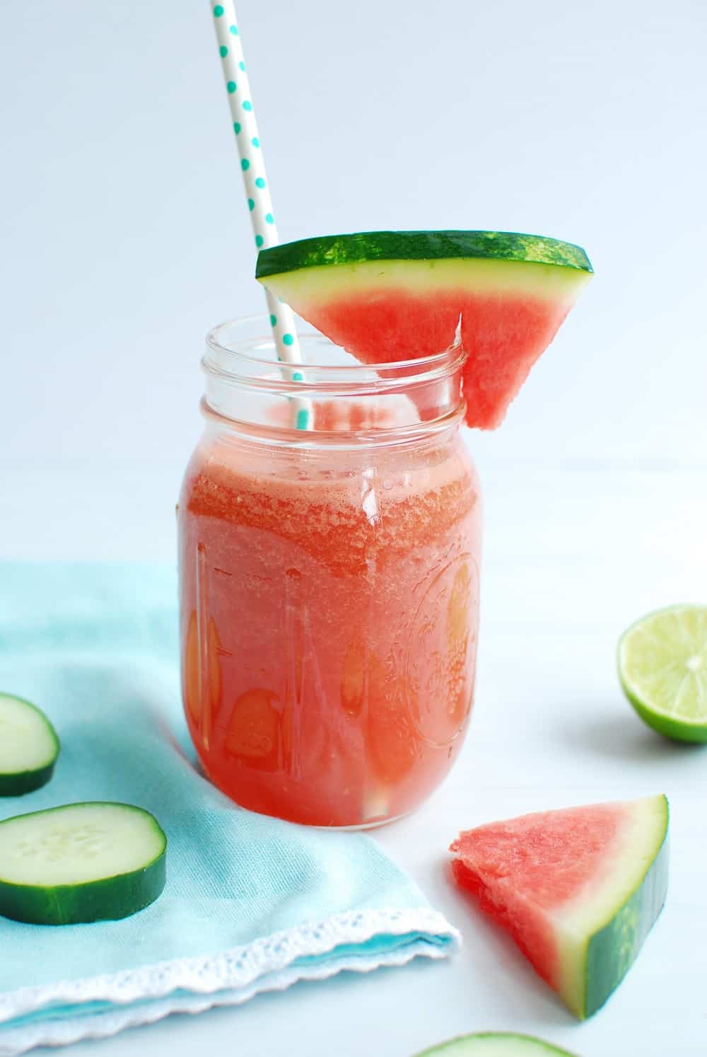 Mason jar full of cucumber watermelon smoothie