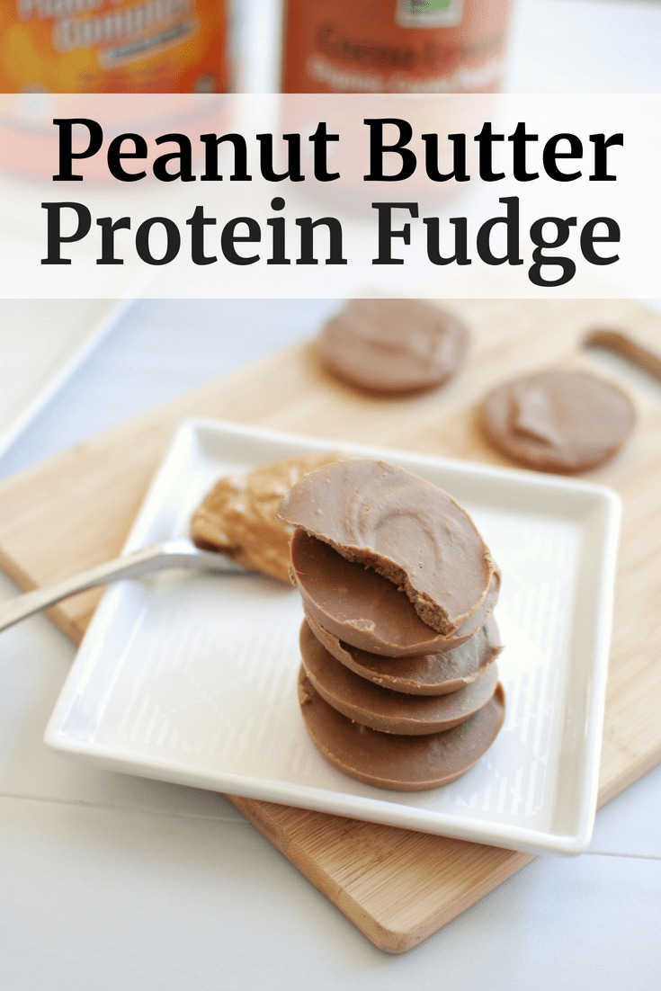 Several pieces of peanut butter protein fudge on a white plate with a text overlay.