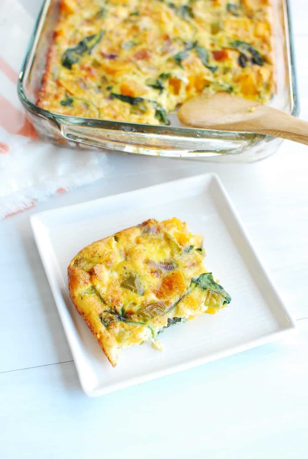 Slice of butternut squash frittata on a plate